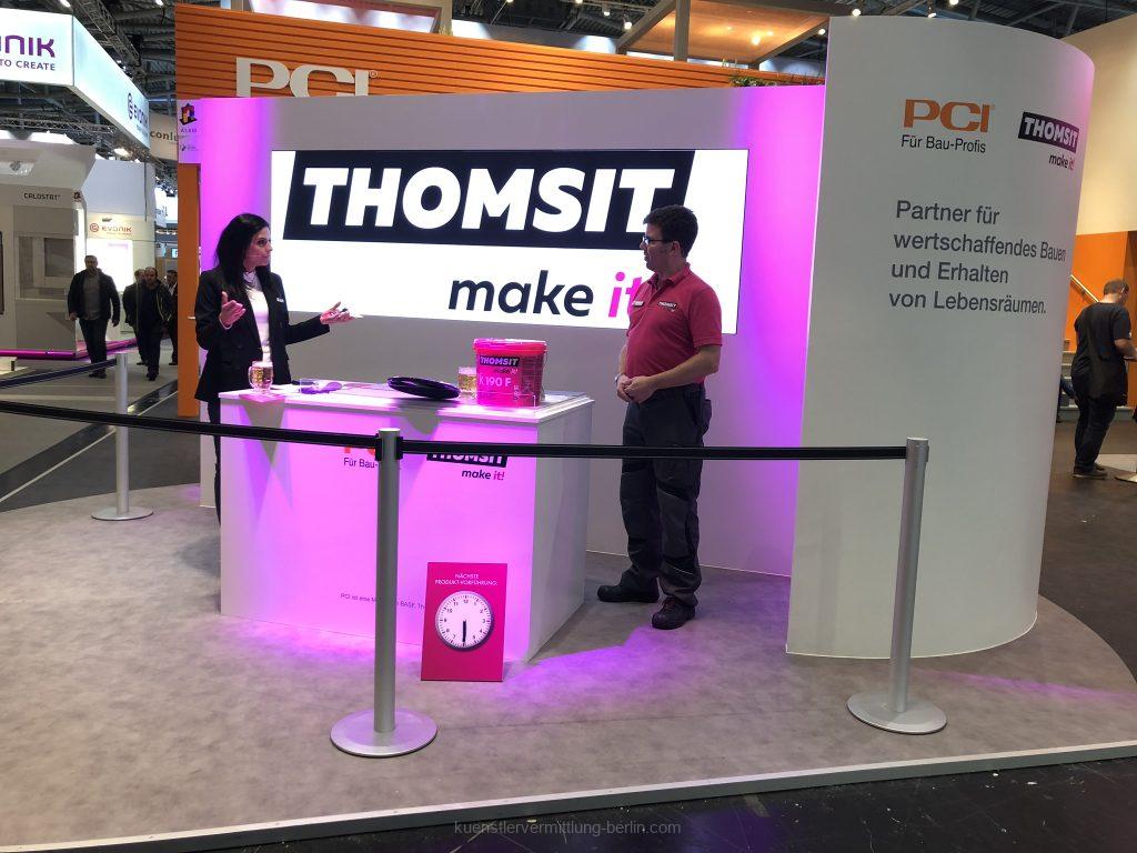 Messe-Moderatorin