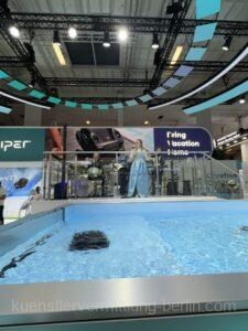 Partyband spielt live auf der IFA Berlin am Messestand von Aipter und sorgt für ausgelassene Stimmung