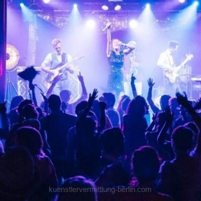 Disco band with female singer and 70s dance show